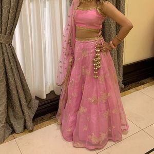 Poonams kaurture style pink and gold lengha